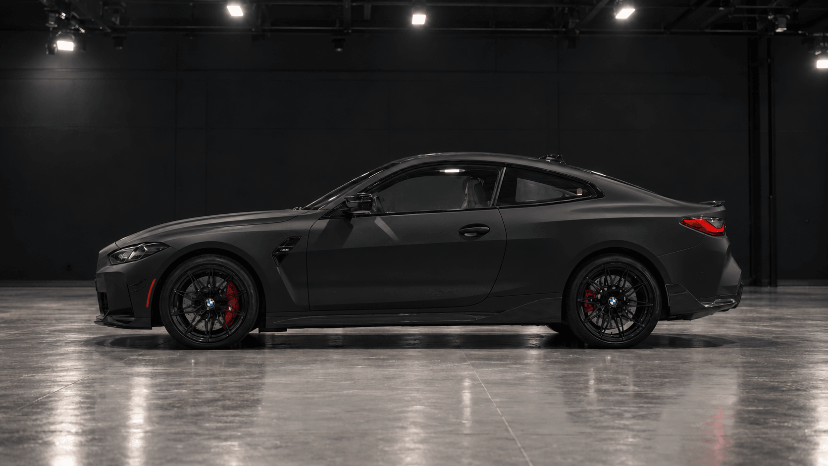 BMW M4 after a satin black vinyl wrap by Flawda Wraps