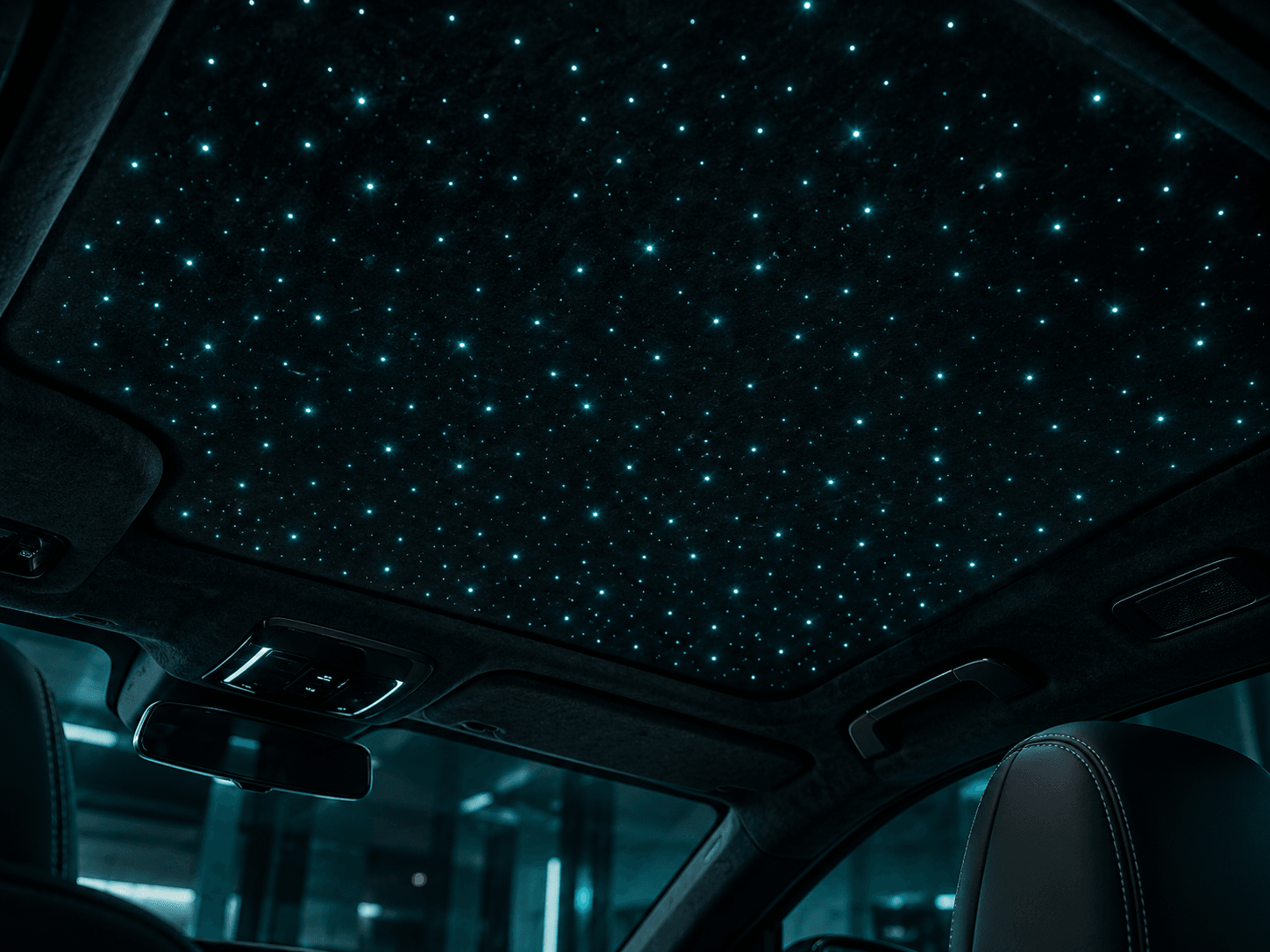 Starlight headliner with blue fiber optic stars glowing across a luxury car interior, installed in Orlando